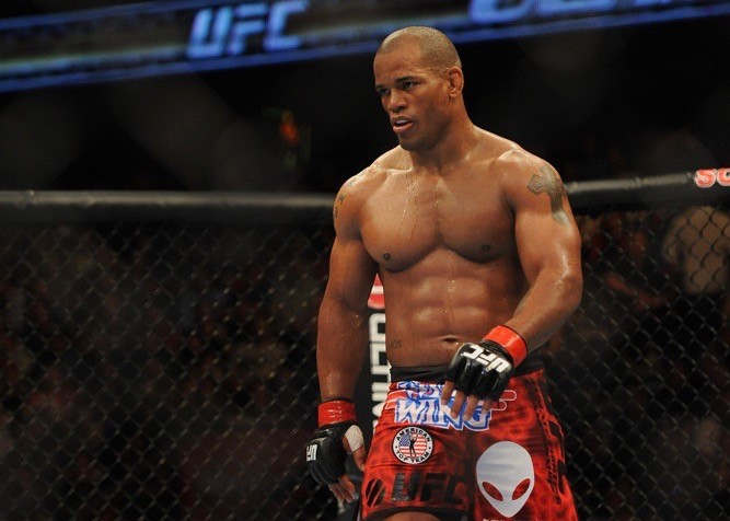 July 21, 2012 - Calgary, Alberta, Canada - HECTOR LOMBARD (red trunks) walks in the octagon during his fight against TIM BOETSCH (black trunks) at UFC 149 at the Scotiabank Saddledome on July 21, 2012 in Calgary, Alberta, Canada. TIM BOETSCH won by split decision